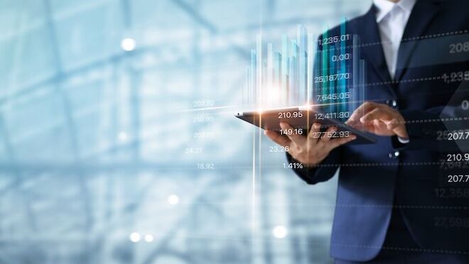 Businessman,Using,Tablet,Analyzing,Sales,Data,And,Economic,Growth,Graph Businessman,Using,Tablet,Analyzing,Sales,Data,And,Economic,Growth,Graph