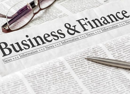 A,Newspaper,With,The,Headline,Business,And,Finance